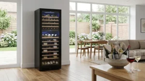 A large freestanding wine fridge situated in a spacious dining area, demonstrating its flexible placement away from kitchen units.