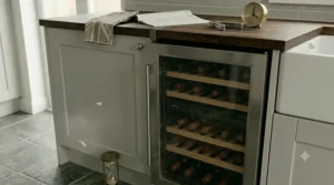 Letting the cooling gases settle before switching on the wine fridge.