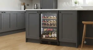 Stylish built-in professional wine fridge featuring a black trim finish and LED interior lighting