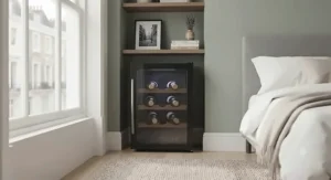 A slimline mini wine cooler for bedroom spaces, tucked neatly into an alcove in a London apartment.