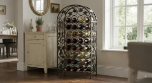 Decorative freestanding wrought iron wine holder filled with red and white wine bottles