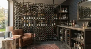 Industrial-style metal modular wine rack system set up as part of a home bar and entertaining space.