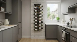 A space-saving black metal wall mounted wine rack installed in a compact UK apartment kitchen.